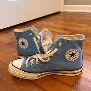 Blue high-top all star converse